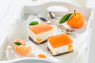 Delicious cheesecake with fresh mandarin and jelly