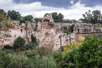 Fototapeta na wymiar Ancient quarry in Neapolis Archaeological Park in Syracuse, Sicily Island of Italy