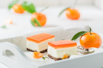 Homemade cheesecake with fresh mandarin and jelly