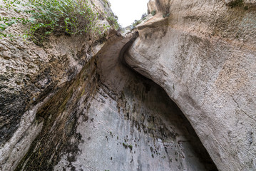 Cave called Ear of Dionysius in ancient quarry, Neapolis Archaeological Park in Syracuse, Sicily Island of Italy
