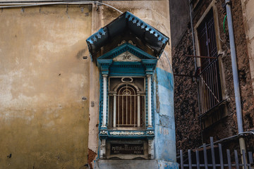 Small shrine on residential building in Catania, Sicily Island of Italy