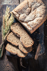 Closeup of fresh bread with whole grains and wheat