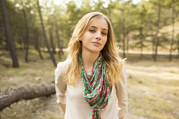 Fototapeta premium Portrait of beautiful blond woman in fairy forest