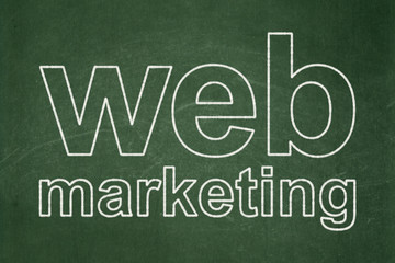 Web design concept: Web Marketing on chalkboard background