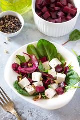 Healthy homemade vegetable salad with beets and nuts. The concept of a healthy diet and detox diet.