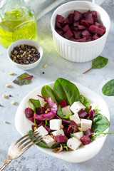 Healthy homemade vegetable salad with beets and nuts. The concept of a healthy diet and detox diet.