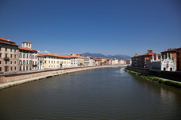 Fototapeta na wymiar travel amazing Italy series - Arno River and Santa Maria della Spina Church, Pisa, Tuscany,
