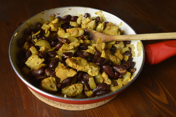Colorful dish: red beans with turkey in curry