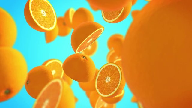 CGI animation of slices of juicy oranges floating against blue background