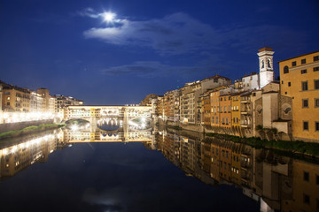 Fototapeta na wymiar travel amazing Italy series - Ponte Vecchio and River Arno at Night, Florence, Tuscany