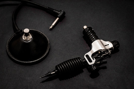equipment for tattoo on black background