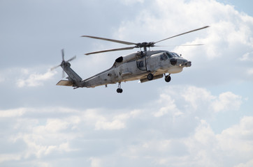 Fototapeta na wymiar Black hawk helicopter nose pull up rescue team