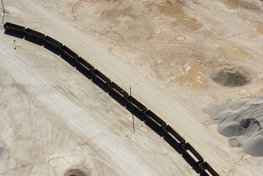 USA, Texas, aerial view of sand mine near San Antonio with unloaded rail cars