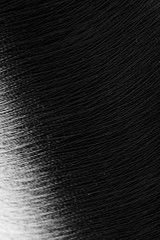 reel black synthetic thread. textile concept. abstract background