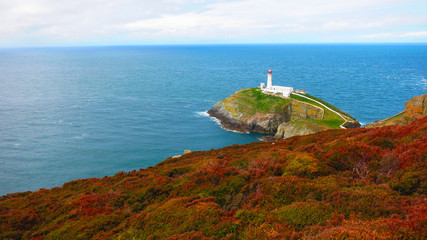 The South Stack Lighthouse - built on the summit of a small island off the north-west coast of Holy Island, Anglesey, Wales. Historically built in 1809 to warn ships of the dangerous rocks below.