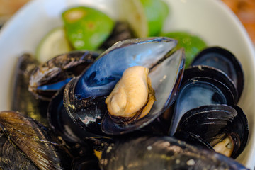 plate of fresh mussels with pepper