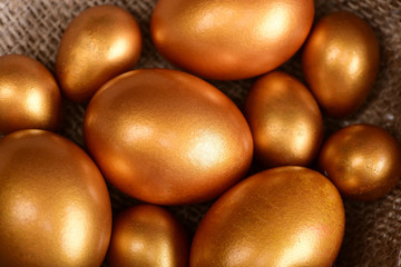 traditional golden eggs, happy easter holiday celebration