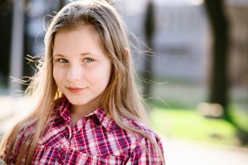 Portrait of happy blond hair ten years girl