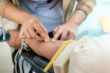 Fototapeta premium Young blood donor With pleasure