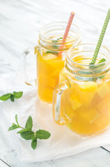 Mango juice in mason jars
