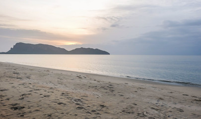 Seacoast and moutain in background.