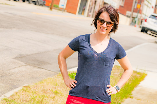 A Young Woman Smiles In Downtown Wilson, NC