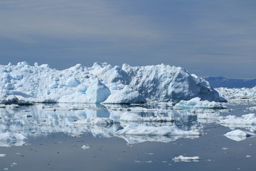 Fototapeta na wymiar Glaciers at a day time boat tour in Ilulissat, Greenland 