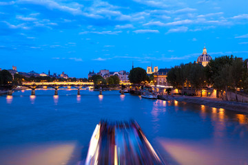 Fototapeta na wymiar Paris and Seine at Night, France