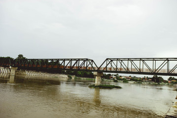 Steel bridge across the embankment