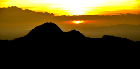 Silhouette of mountain on sunset time