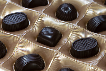 Chocolate candies assortment in a box close-up