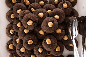 Chocolate cookies on white background. Top view.