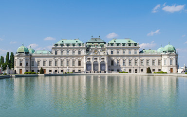 Fototapeta na wymiar Reflections in the pond in the gardens of Belvedere Palace, Vienna, Austria