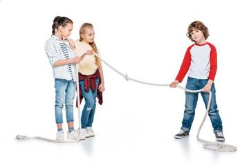 Kids play tug of war