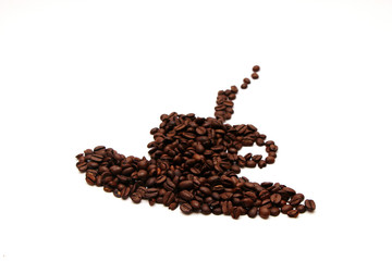 A picture of coffee beans on a white background - a cup of hot brewed coffee on a saucer