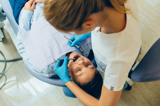 Dentist carrying out a thorough examination