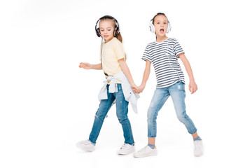 Obraz premium Kids in headphone listening music