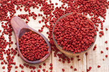 Seeds of achiote, originating from central america and parts of south america is used to season and color food