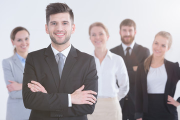 Leader with team in background
