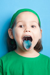 Little girl with blue tongue