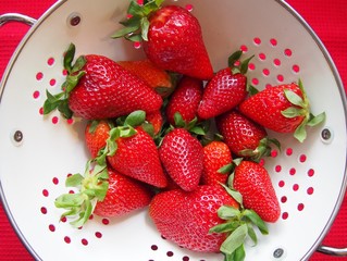 Strawberries in the white strainer