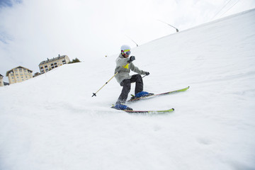 Fototapeta na wymiar Skier on piste in high mountains