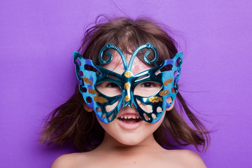 Girl in carnival mask 