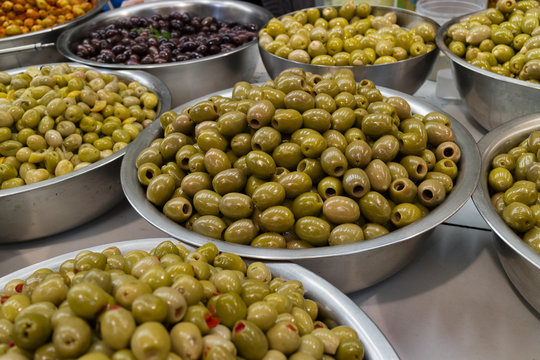 Bowls with different types of olives