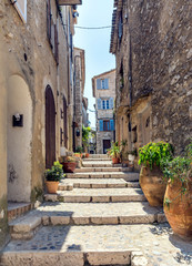 typical narrow street in Saint Paul de Vence, France - 146250973