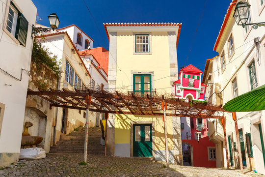 The typical street in Alfama, the oldest district of the Old Town, Lisbon, Portugal