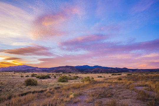 sunset over desert mountains 