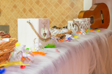 Rainbow wedding or event production. Heart lantern with coloured plumage and handmade ball favor  PACE e AMORE (translation PEACE and LOVE)