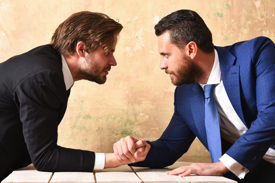Lawyers arm wrestling. Leadership and competition concept