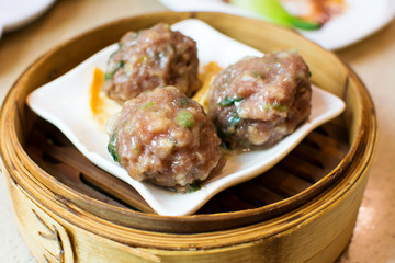 Beef meatballs on bamboo food steamer